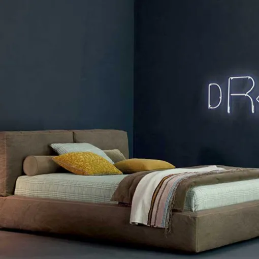 Academy Piuma bed with blanket stitching