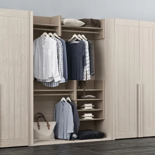 walk-in closet in wood shingle night